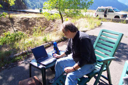 Pat using QX3 and laptop on location in Fraser Canyon